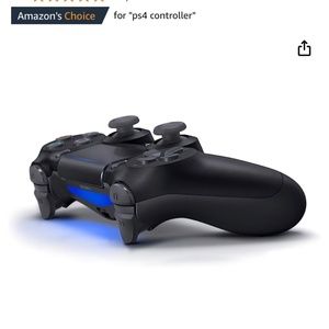 2 ps4 controllers jet black and a rainbow light up keyboard